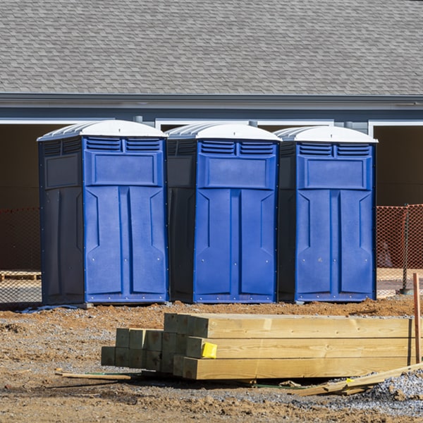 what is the maximum capacity for a single portable restroom in Kaycee